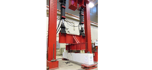 Structural performance of severely damaged reinforced concrete beams after SRP repair 